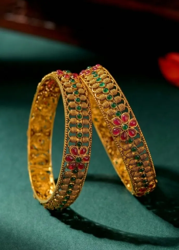 Intricate gold filigree & floral stones make bangles a dazzling statement of classic beauty. (2.4)