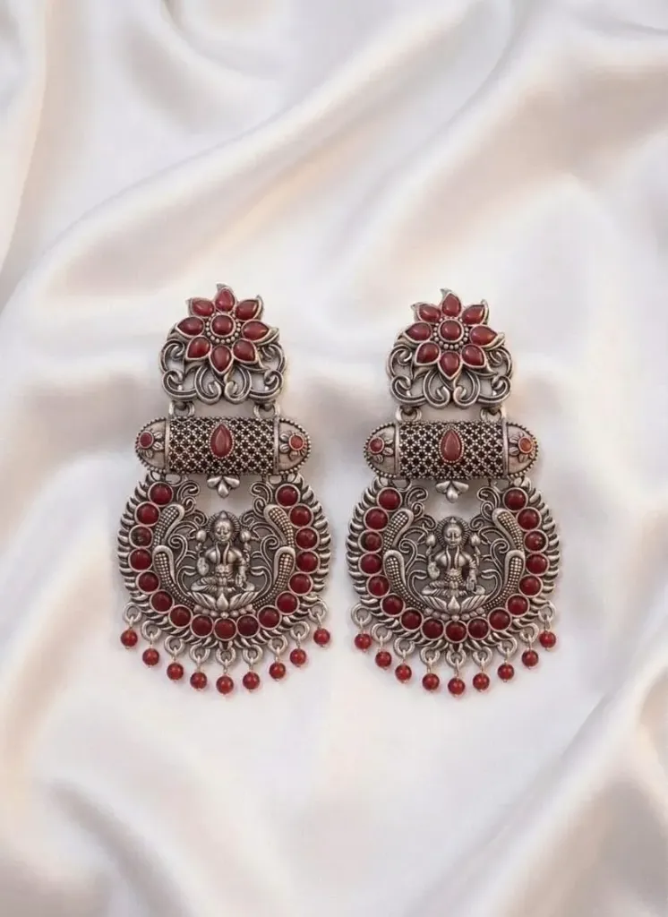 Add a touch of elegance to your look with these stunning silver earrings.