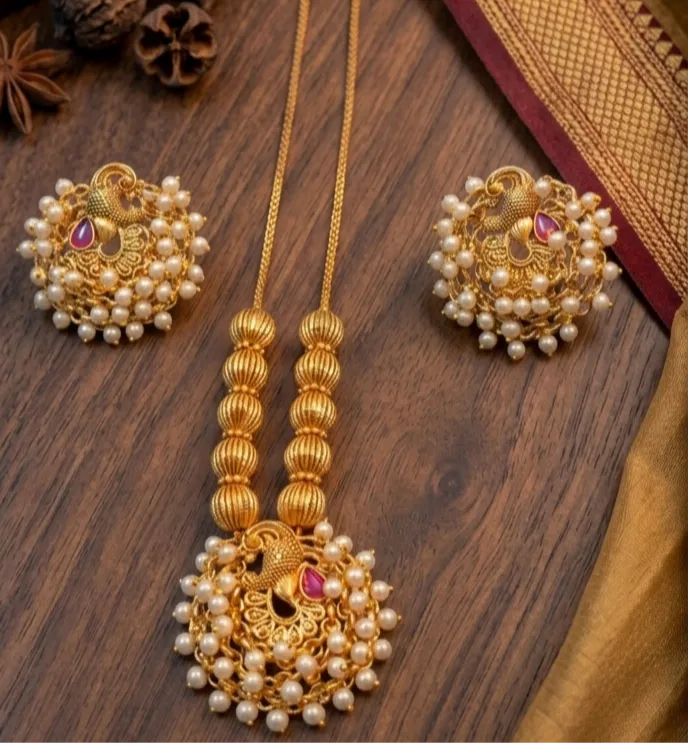 Golden Peacocks, pearls of grace, and a Short Haram that embodies timeless heritage.