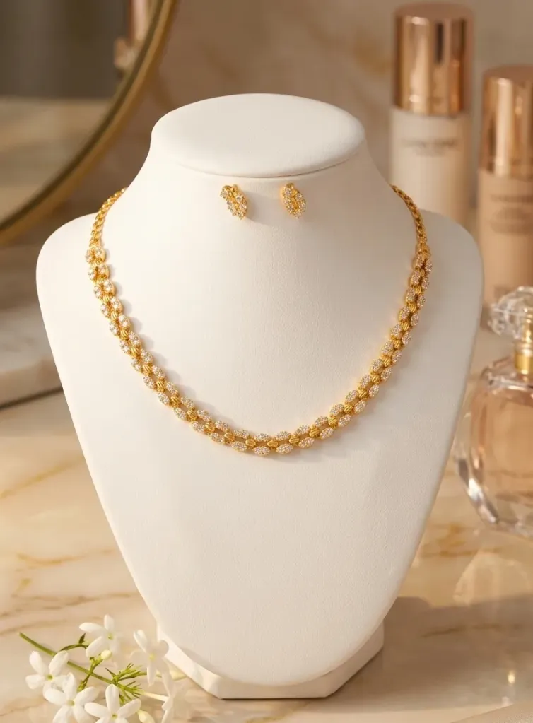 Timeless elegance in gold-toned and AD: a luxurious necklace & Earrings set that adds sparkle to every moment.